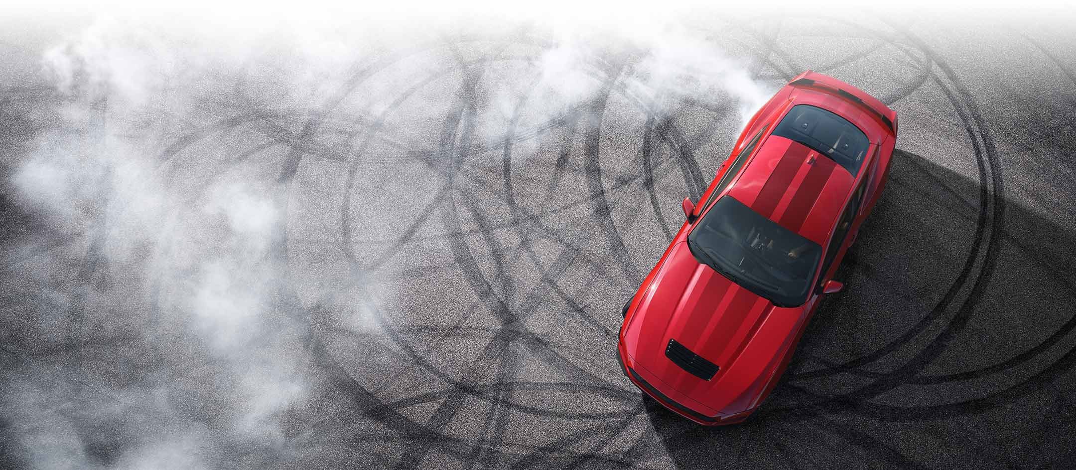 Overhead view of a 2024 Ford Mustang® model with tire tracks on pavement | Al Packer Ford Royal Palm Beach in Royal Palm Beach FL
