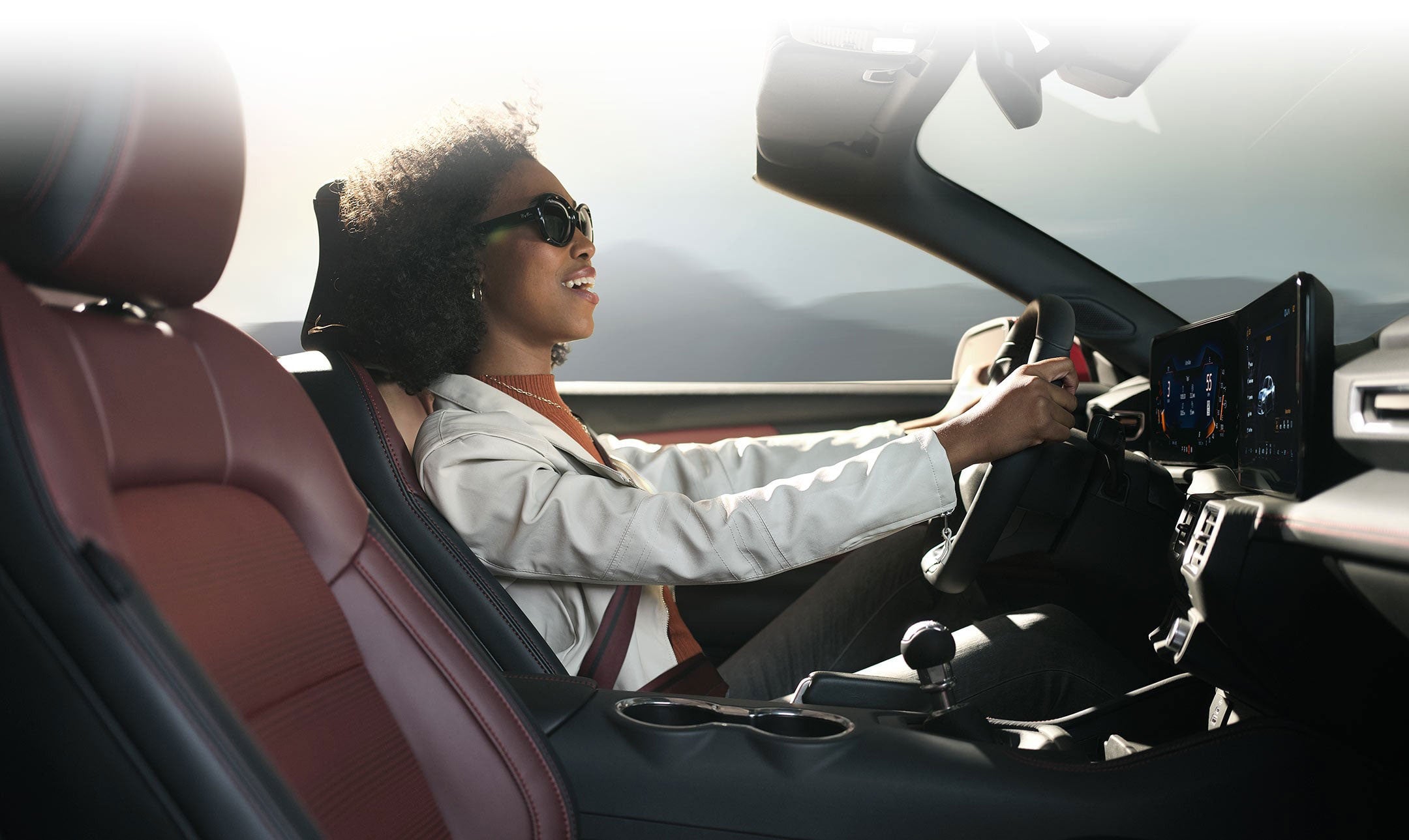 Person sitting in the driver’s seat of a 2024 Ford Mustang® convertible | Al Packer Ford Royal Palm Beach in Royal Palm Beach FL